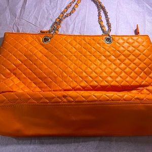 This is a slightly bright orange bag